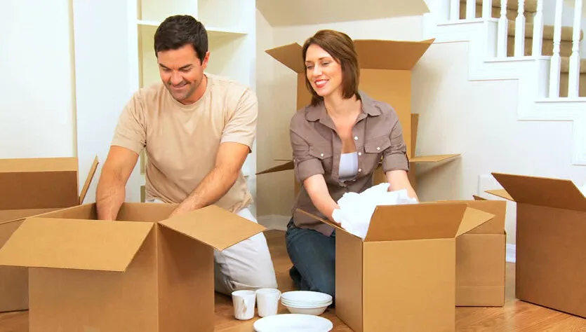 a man and women is packing movers and packer dubai cost